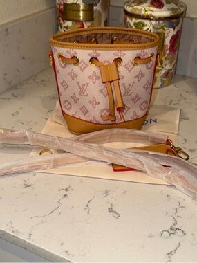 Pink Monogram Mini Bucket Crossbody Bag